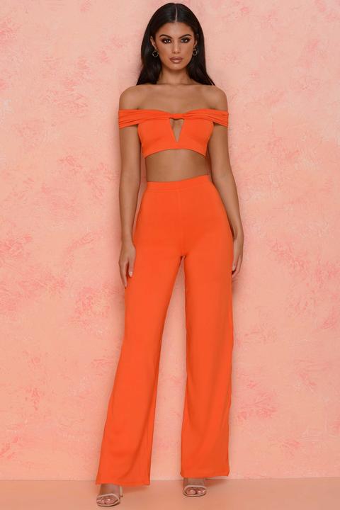 orange high waisted trousers