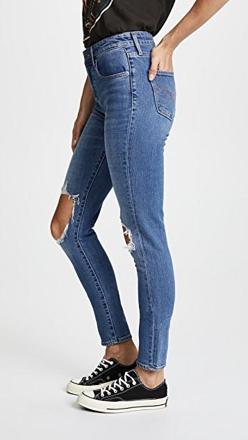 721 high rise distressed skinny jeans