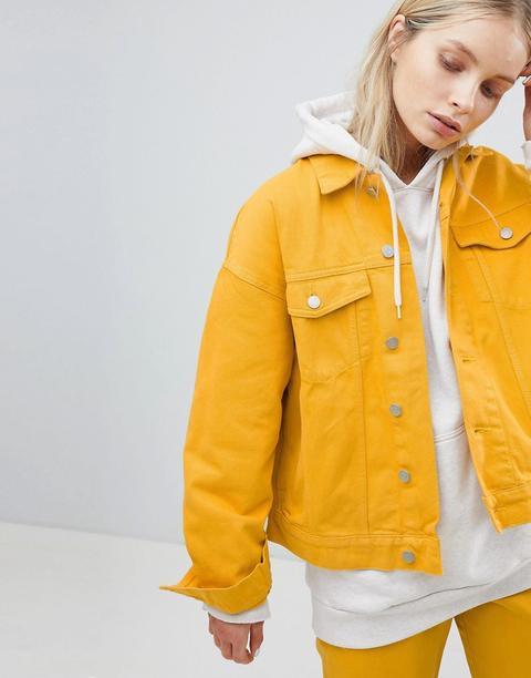 denim jacket with yellow hoodie