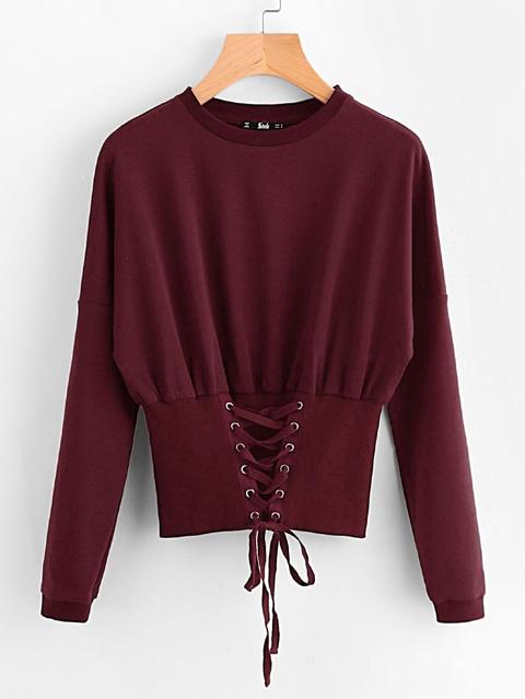 Grommet Lace Up Wide Hem Sweatshirt