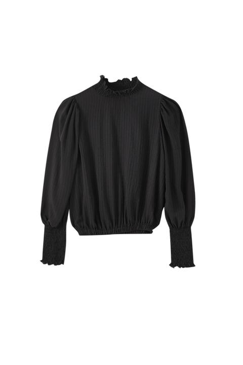 Blusa Negra Goma Canilla