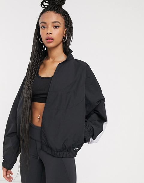 Chaqueta Deportiva Tejida En Negro Con Detalles Reflectantes De Reebok