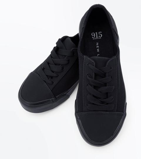 black canvas trainers
