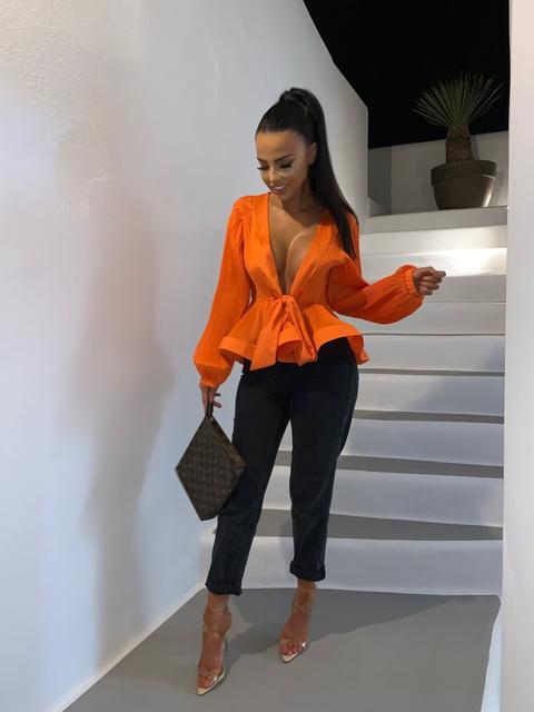 orange peplum top