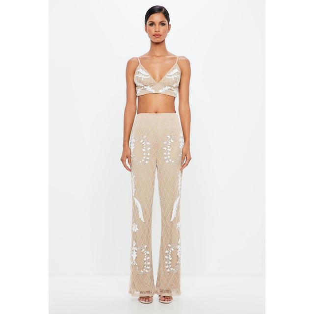 nude flared trousers
