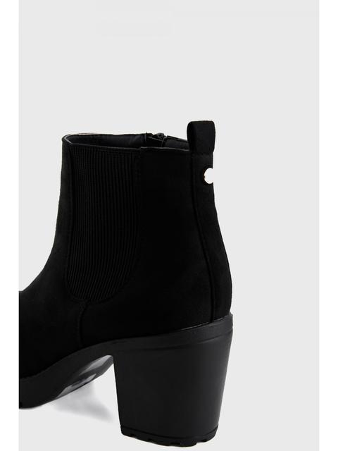 black cleated chelsea boots