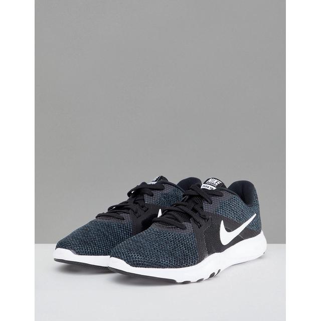 nike training flex sneakers in black