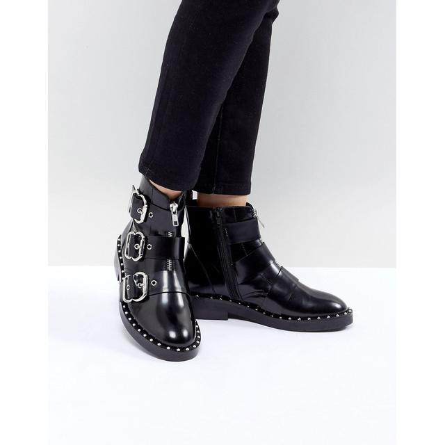 black leather buckle ankle boots