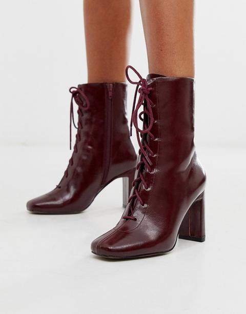 red lace up heeled boots