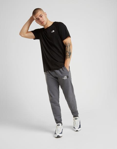 grey north face tracksuit bottoms