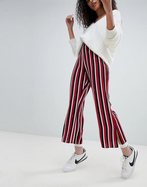 red striped flared trousers