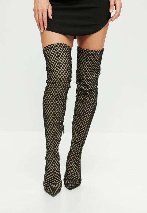 over the knee fishnet boots