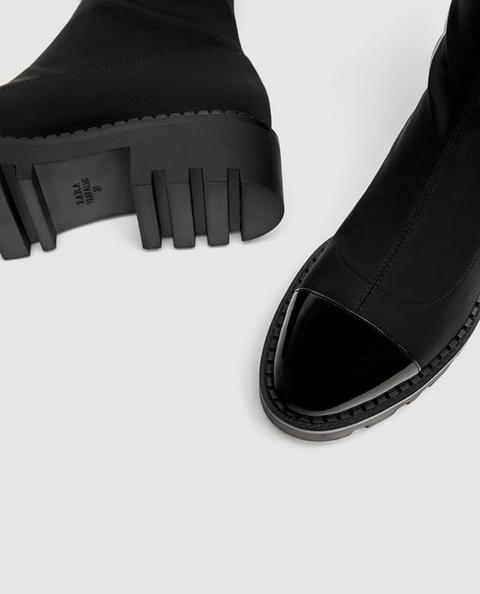 zara flat ankle boots with toe cap detail