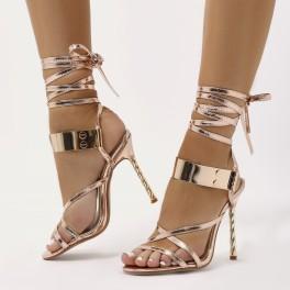 Libra Twisted Stiletto Metal Cuff Heels In Rose Gold