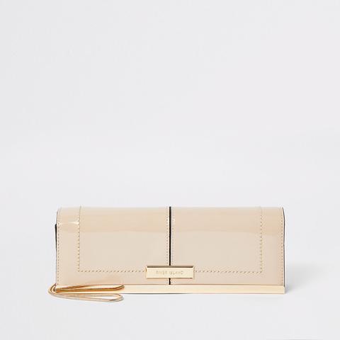 beige patent clutch