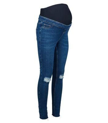 Umstandsmode Blaue Skinny Jeans Mit Zerrissener Kniepartie Und Uberbauchbund From New Look On 21 Buttons