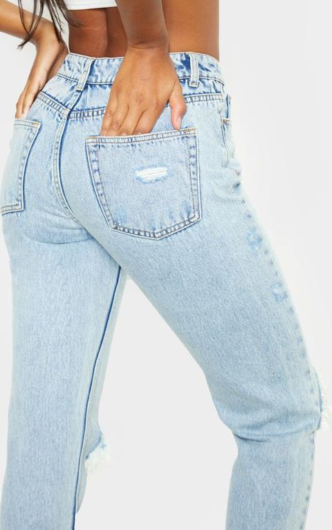 straight leg jeans with knee rips