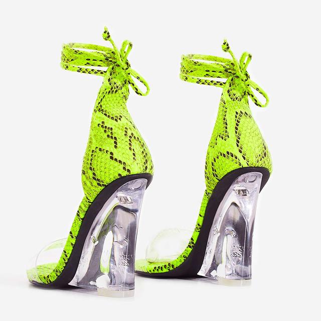snake print perspex heels