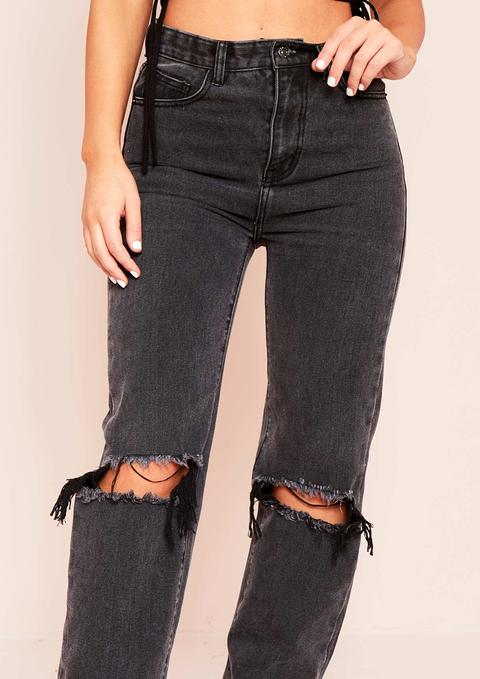 black distressed knee jeans
