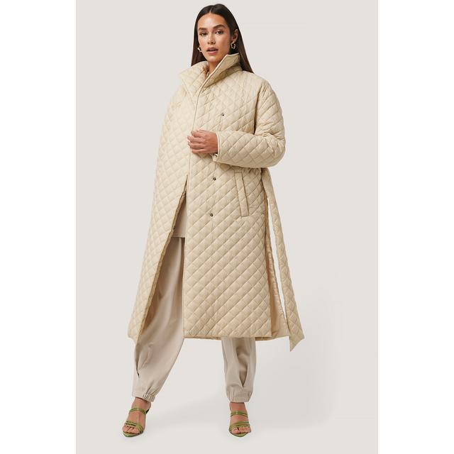 beige quilted coat
