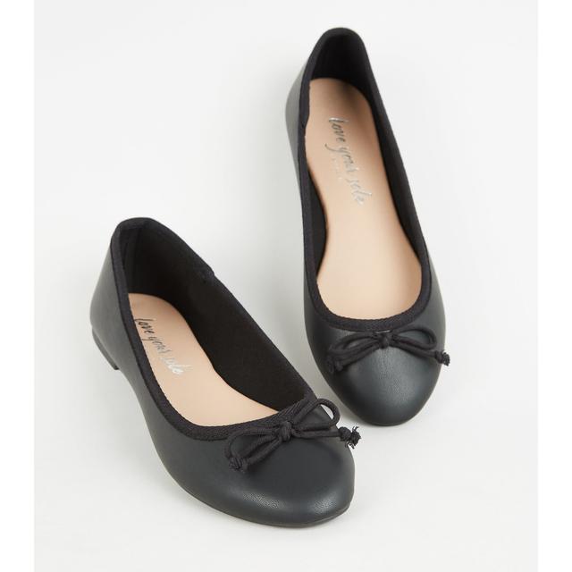 black shoes with bow on front
