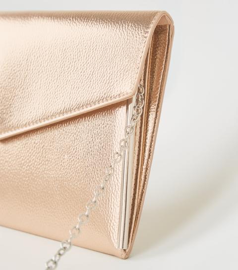 new look rose gold clutch