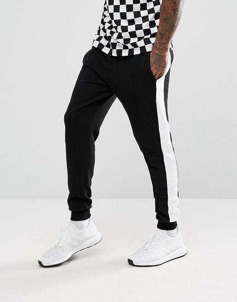 Joggers Negros Con Rayas Blancas De Granted