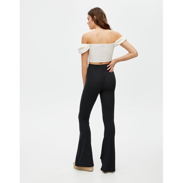Pantalón Campana Negro de Pull and Bear en 21 Buttons