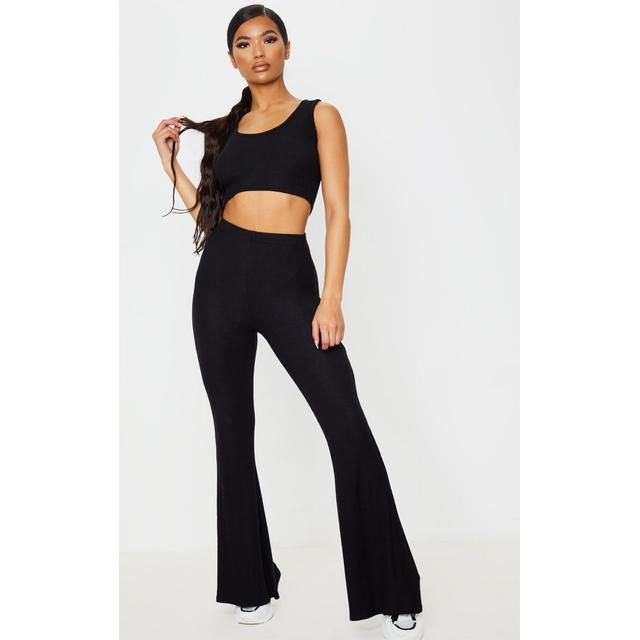 black flared ribbed trousers