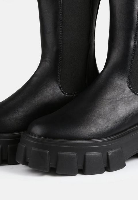 black shin high chunky sole boots