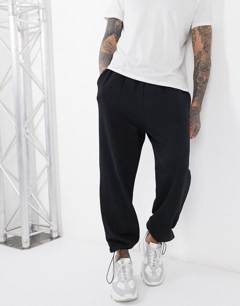 Asos Design Oversized Joggers In Black With Toggle Hem